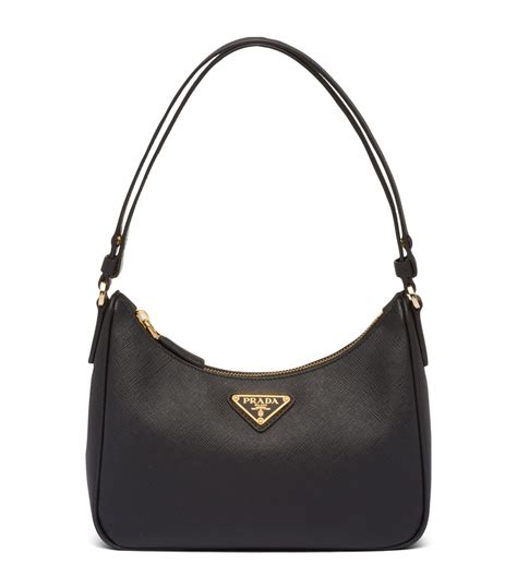 prada black luxe saffiano golden clasp bag|Prada saffiano leather bag.